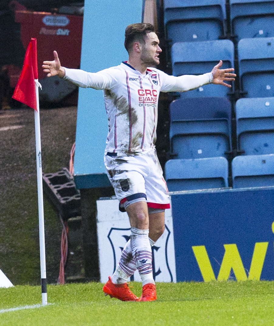 Ross County's Alex Schalk celebrates after making 3-1 against Dundee on Saturday.