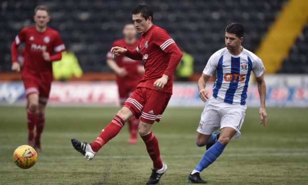 Brora's John Pickles in action against Kilmarnock.