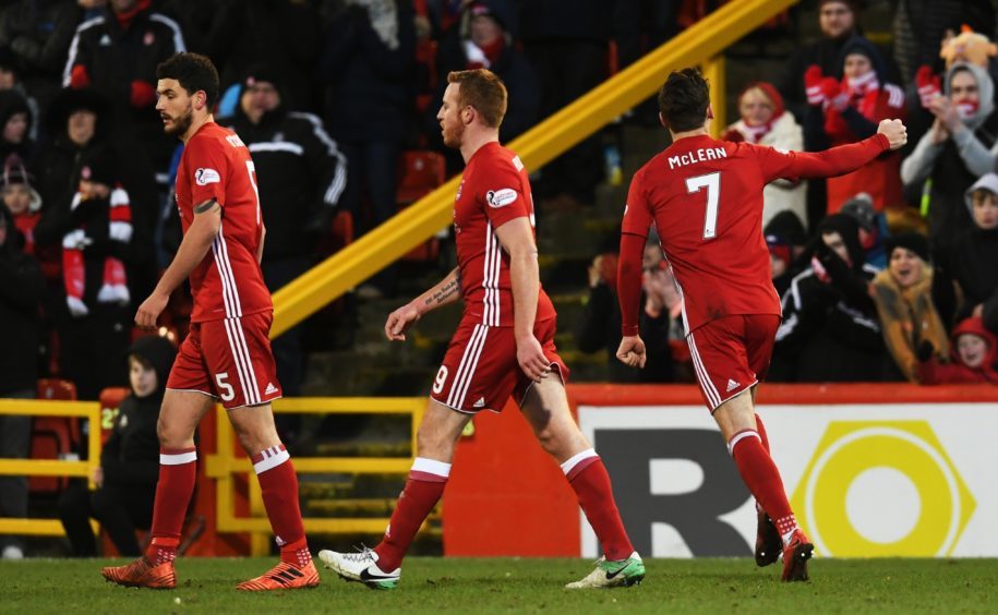 Aberdeen's Kenny McLean (R) celebrates his goal with team mates