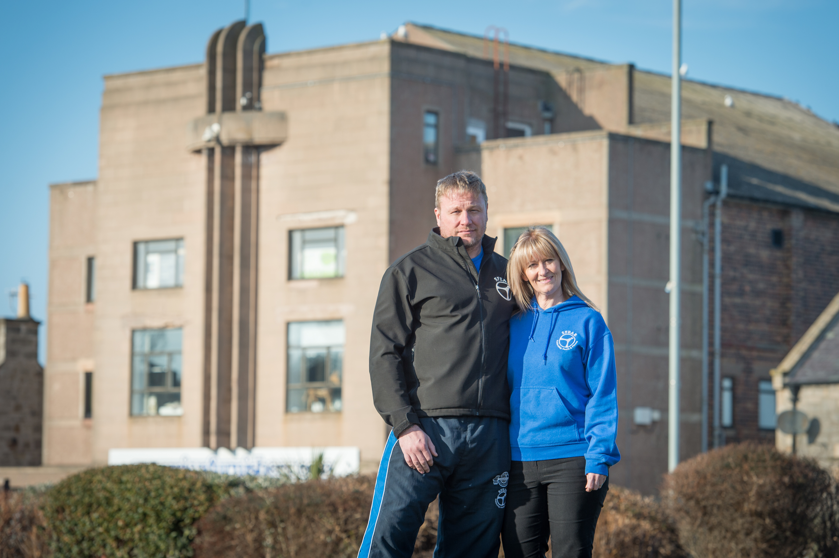 Husband and wife team Jason and Jill Fletcher from Sfear Kickboxing outside Lossiemouth's Grampian Furnishers.