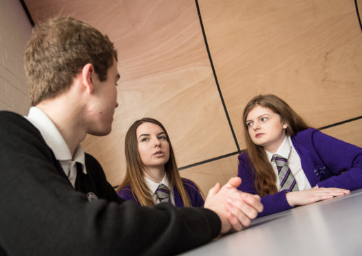 Speyside High School pupils Thomas Cattanach, Rachael Laing and Louise Knight  discuss mental health.