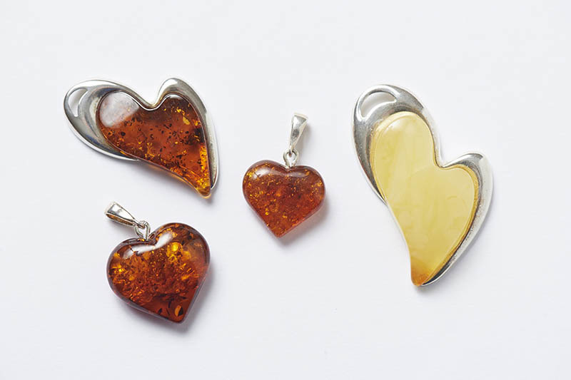 Aeternum – Unique gifts from around the world. (Illustrated Amber pendants from £29.50) Designer Amber jewellery with healing properties. Baltic Crystal glassware. Delightful handmade amber trees.