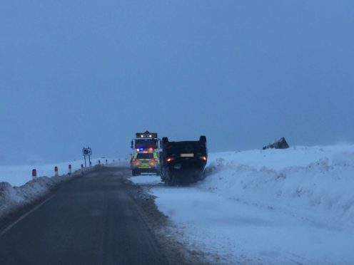 The car ended up on its roof on the A82. Picture: Police Scotland.