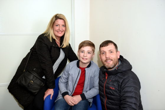Pictured are from left, Suzi Robertson, Zak Robertson and Murray Robertson. Their son Zak Robertson auditioned for the movie.