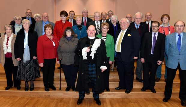 Right Rev Dr Derek presented long service certificates to 26 people including elders, sunday school teachers and choralists at a special ceremony at Mannofield Parish Church (Picture: Colin Rennie)