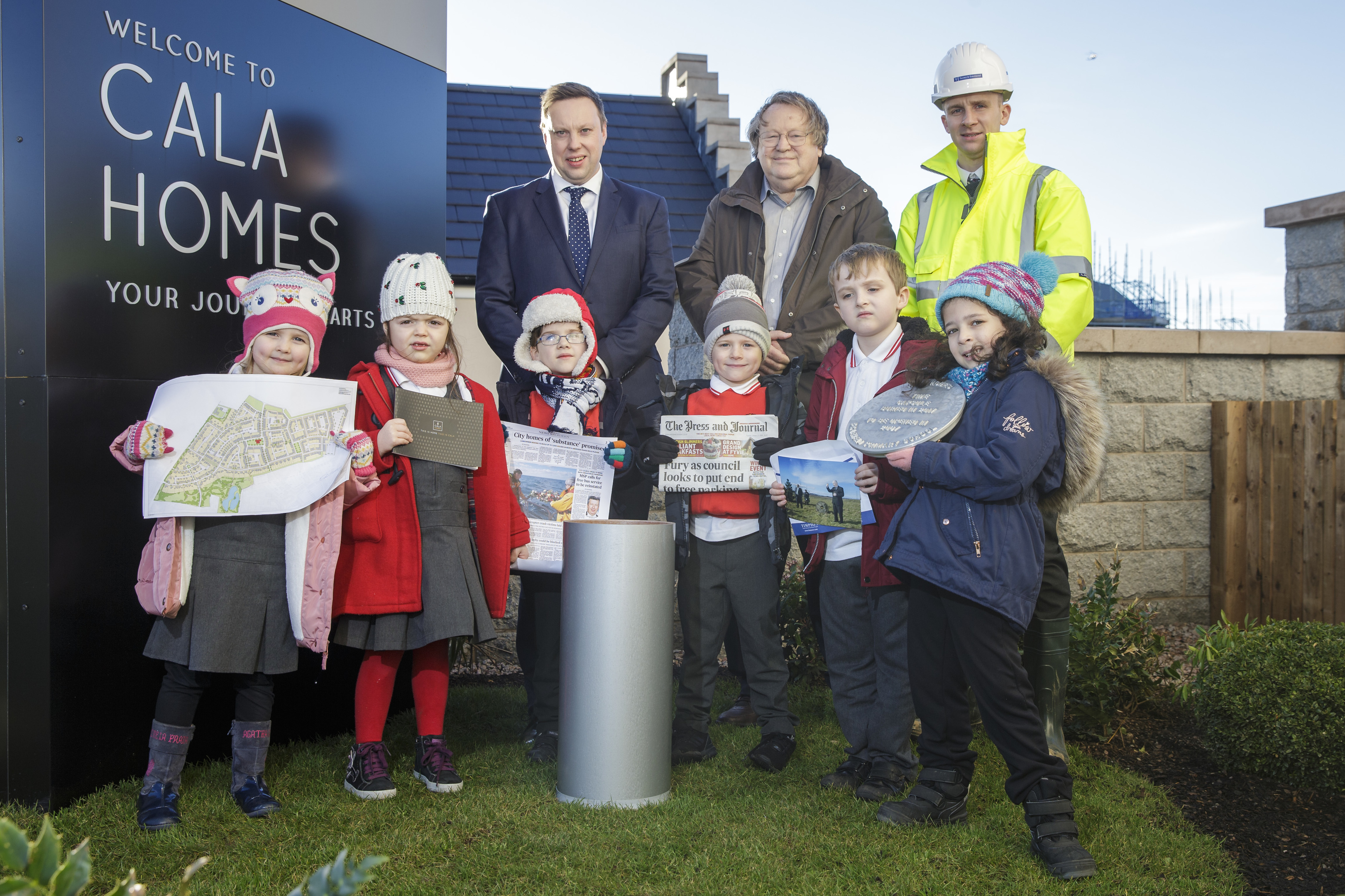 Braehead Primary School pupils buried the time capsule with staff from the Grandhome Trust. 
Photo: Ross Johnston/ Newsline Media