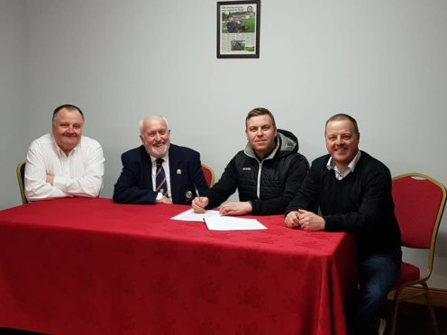 Kris Hunter, second from right, has been named manager of Turriff United