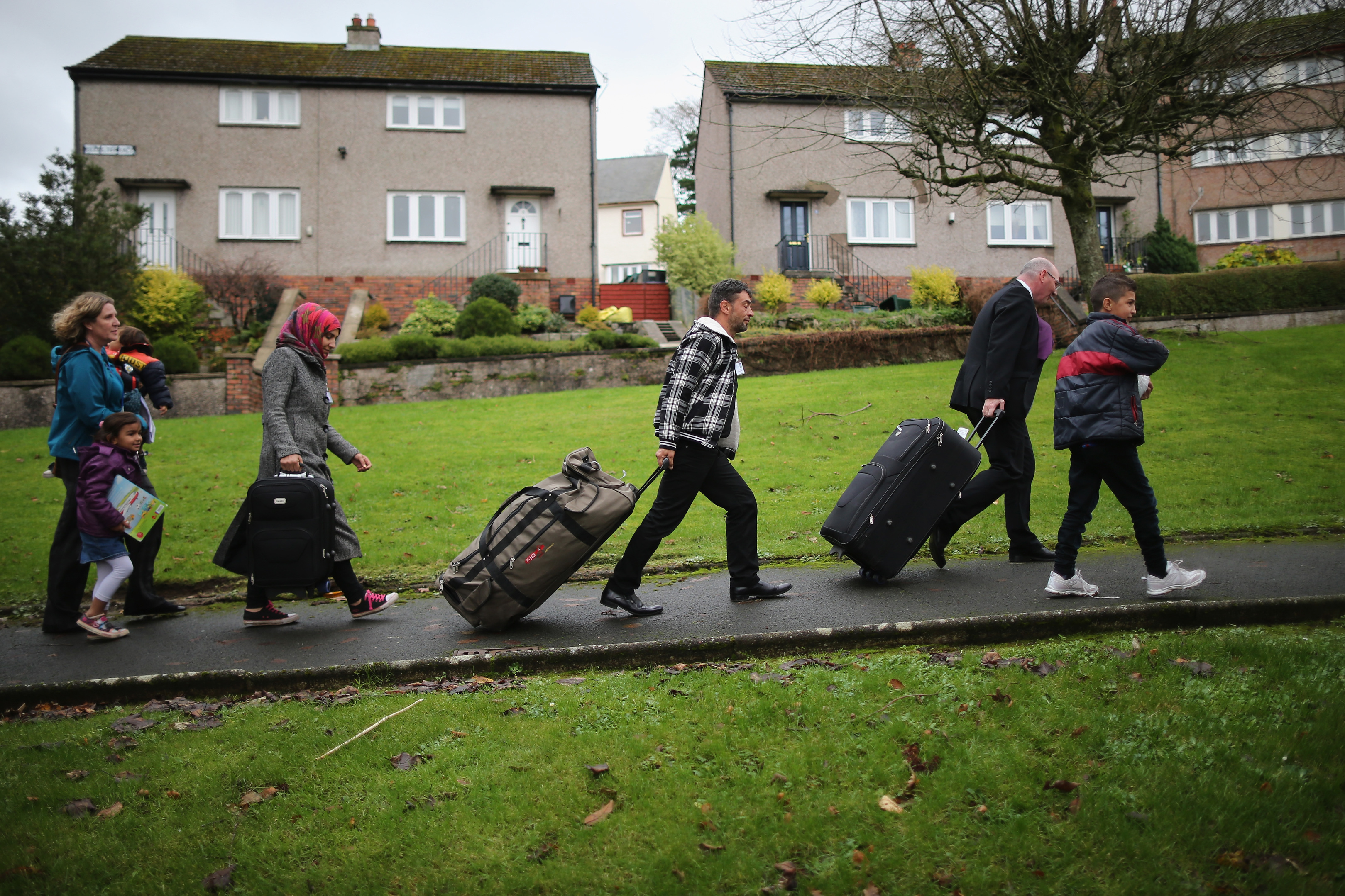 Syrian refugee families arrive at their new homes on the Isle of Bute.