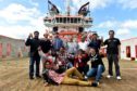 The crew of the Malaviya Seven in September last year after the news the ship could be sold