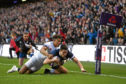 EDINBURGH, SCOTLAND - FEBRUARY 24:  Sean Maitland of Scotland scores a try under pressure from Athony Watson of England during the NatWest Six Nations match between Scotland and England at Murrayfield on February 24, 2018 in Edinburgh, Scotland.  (Photo by Shaun Botterill/Getty Images)