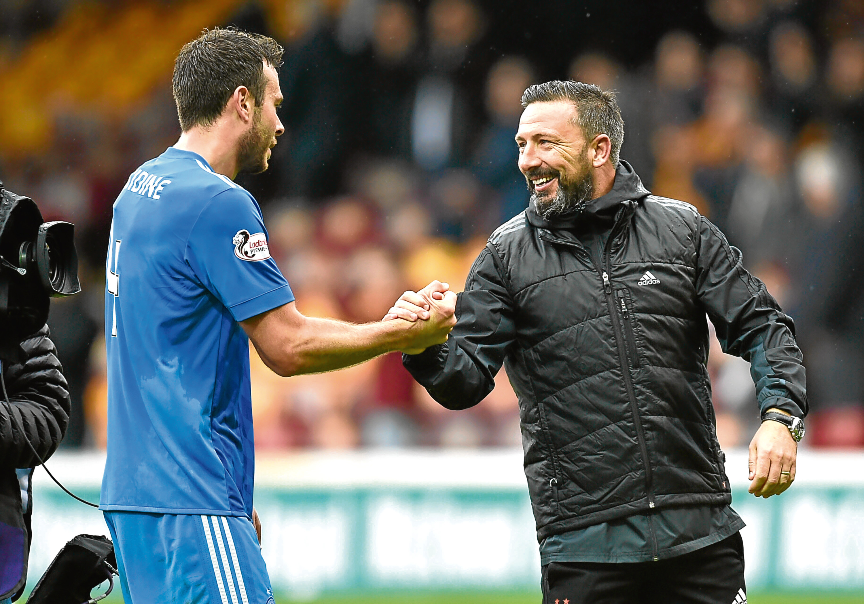 Aberdeen's Derek McInnes (R) and Andy Considine at full-time.