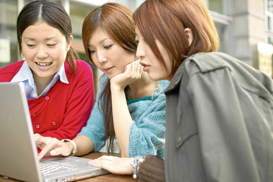 A Generic photo of students looking on the internet.  See PA Feature PARENTING Clever. PA Photo/Generic