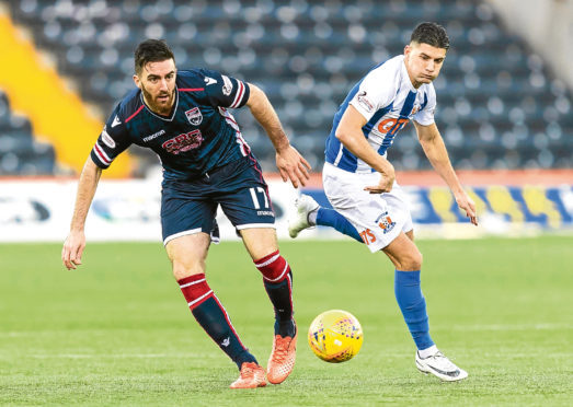 Ross Draper (left) has signed a new one-year deal with Ross County.