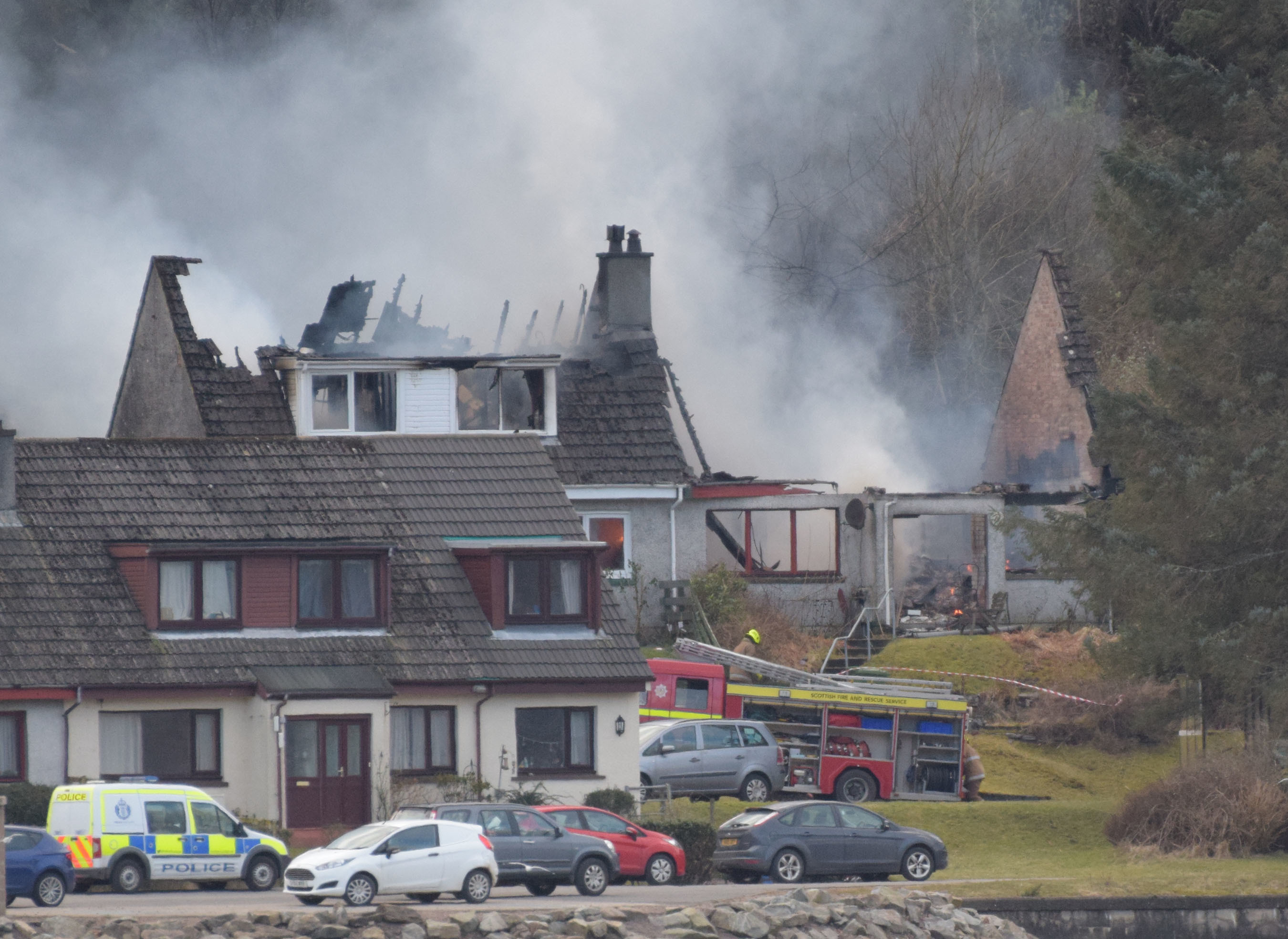 Two houses ablaze in the tiny lochside village of Ardgour.