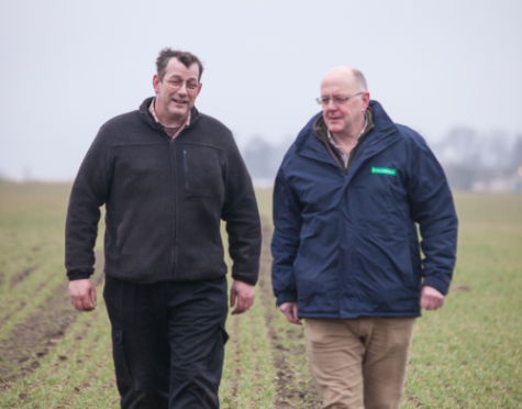 Farm manager Craig Norrie, left, and Douglas Bonn, of Nickerson seed company, with this year’s wheat crop