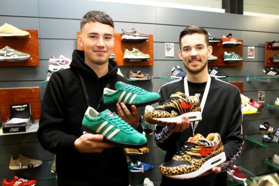 With the limited edition trainers Lloyd Morrison, left, holding the Adidas Dublin trainers, and Chris Brash holding the Nike Atmos Safaris, in Size in Dundee.