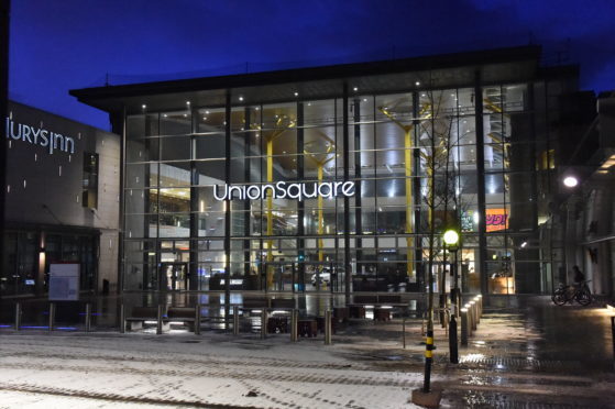 Bus station sealed off at Aberdeen's Union Square.