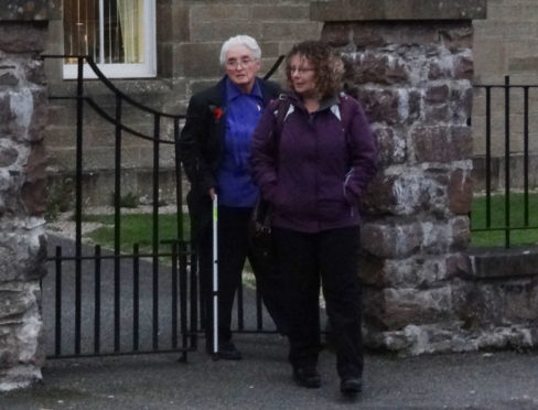 DAMAGE CLAIMS: Lewis crofter Kathleen Allen, at back left, has raised a civil action case against neighbours David and Janine Hargreaves.