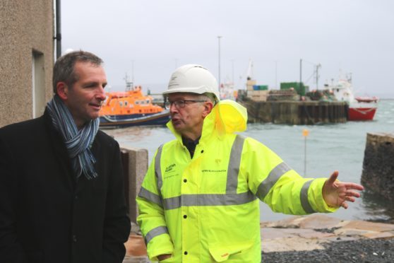 Liam McArthur MSP and site manager Chris Wright