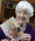 100-year-old Mona Brown from Salen with her card from the Queen.