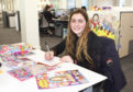 Mirissa Efemey at her very own desk for the day in DC Thomson’s children’s magazine department, Dundee.