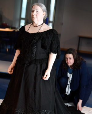 Museum Officer Nicola McHendry, at Garioch Heritage Centre, Inverurie, with one of Queen Victoria's dresses which is on display.    
Picture by Kami Thomson.