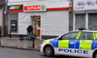 Police Scotland attend the scene of a robbery at the Spar on Clifton Road, Aberdeen.