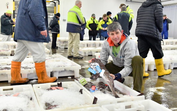 Alistair Dutton in Fraserburgh Harbour Fish Market.