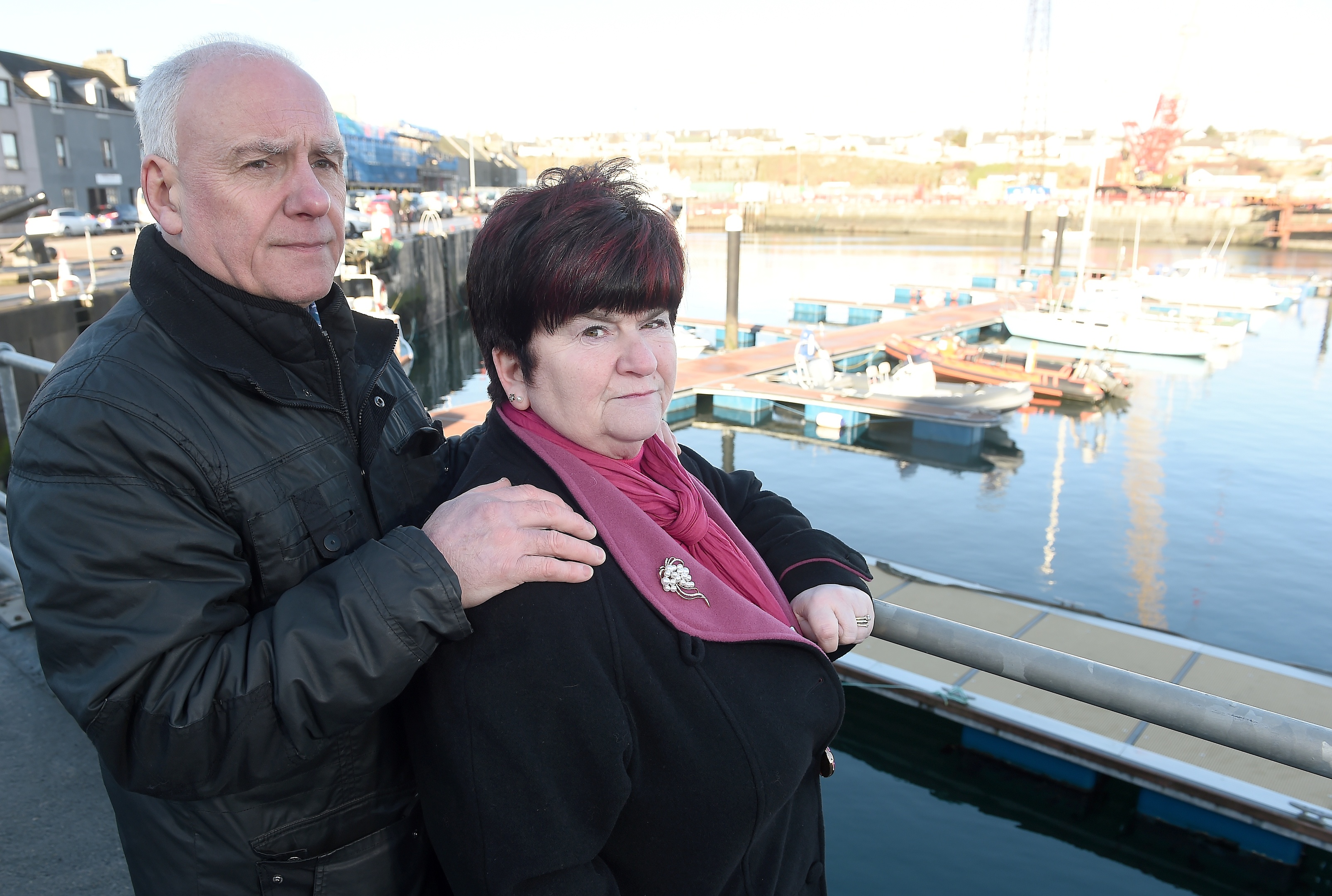 June and Hugh McLeod, parents of Kevin, close to where he was found in Wick Harbour 21 years ago.