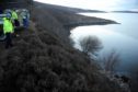 The Honda Civic is recovered from Little Loch Broom near Ardessie.