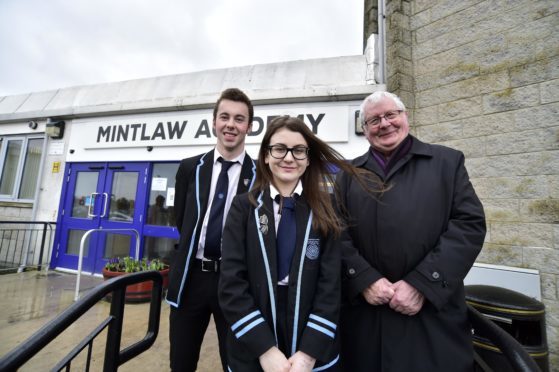 Cllr Norman Smith with Mintlaw Academy Head Boy Alastair Strachan and Deputy Head Girl Emily Findlay.