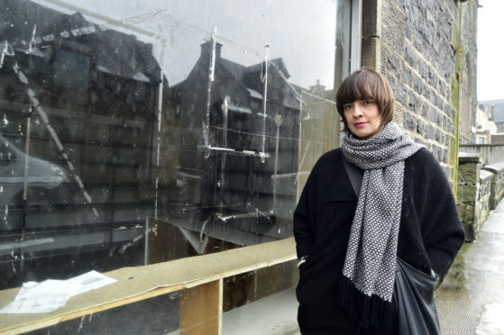 ARTIST ALICJA ROGALSKA  AT THE DISUSED SHOP IN DUFF STREET WHERE SHE WILL BE SETTING UP AN INSTALLATION FOR THE MACDUFF REVIVAL EVENT.
