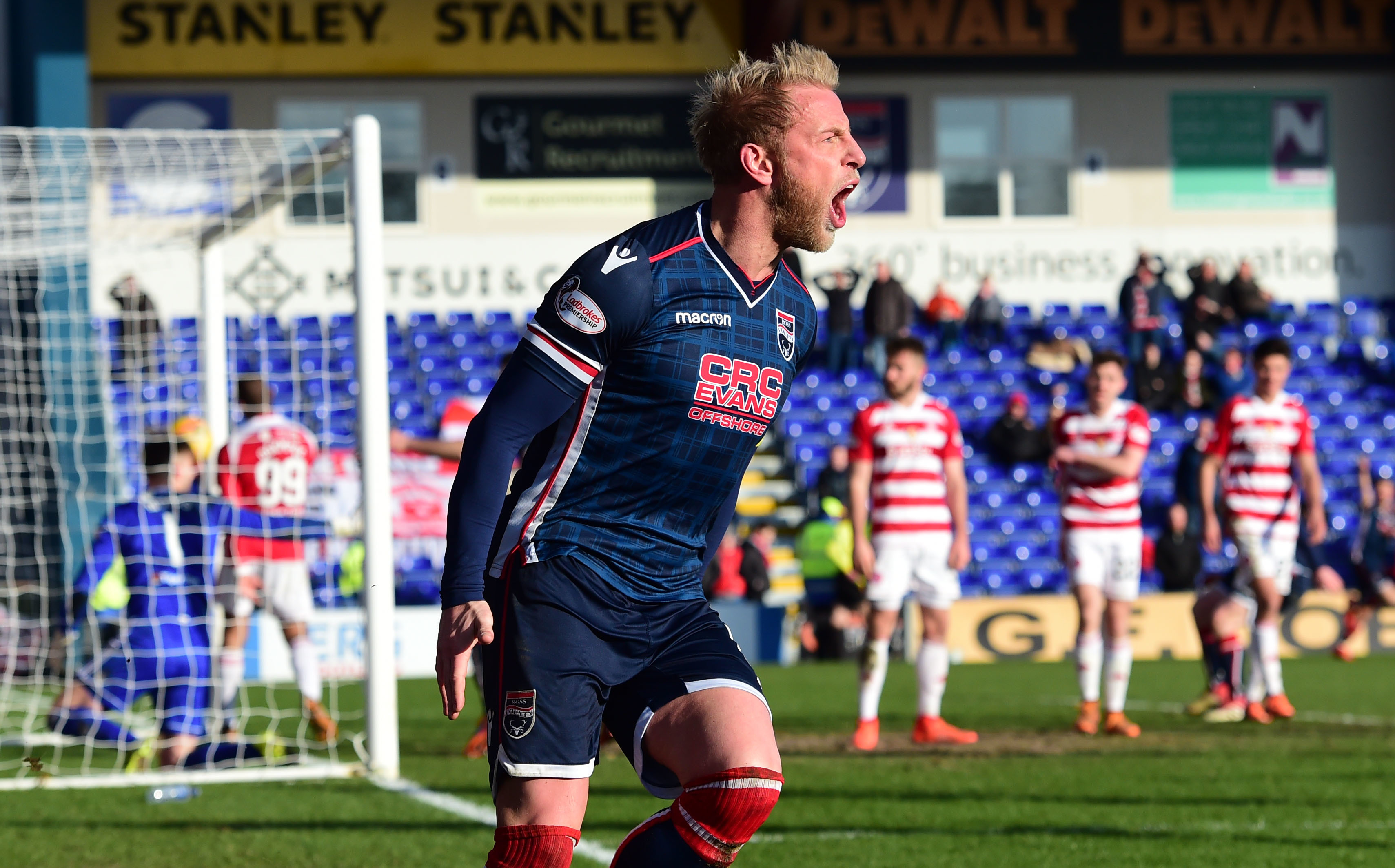 Ross County's Andrew Davies celebrates scoring his side's second goal