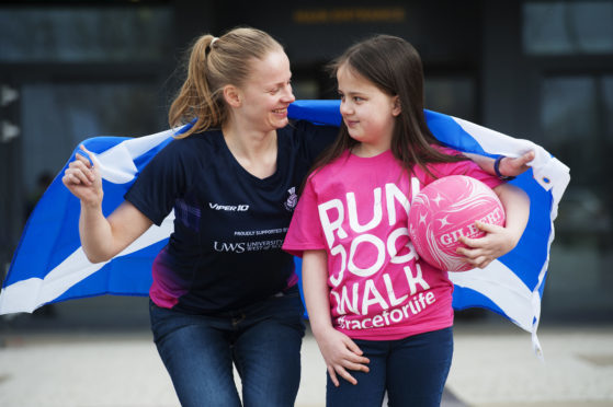 Scottish Thistles team captain Claire Brownie with nine-year-old Amy Reid. Photo by Mark Anderson.