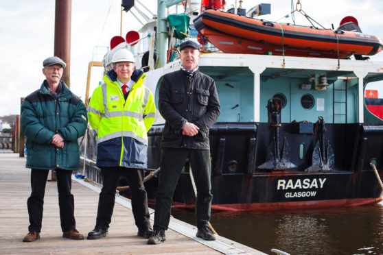 Gordon Law (left) and Stuart Craig of the Clyde River Steamer Club joined CalMac’s small vessel technical superintendent, Jonathan Davies for a last look around the vessel.