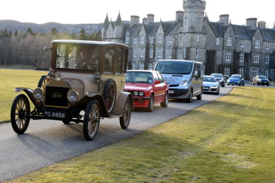 The classic and electric car run on the NE 250 motor tour route.