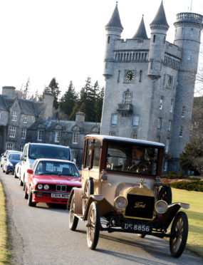 The classic and electric car run on the NE 250 motor tour route.