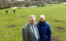 Councillor Bill Cormie, left and Peter Stephen at the site where trees were vandalised at Westburn Park, Aberdeen.