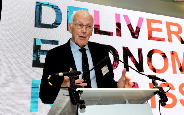 Sir Ian Wood speaking at the Chester Hotel on Queen's Road.