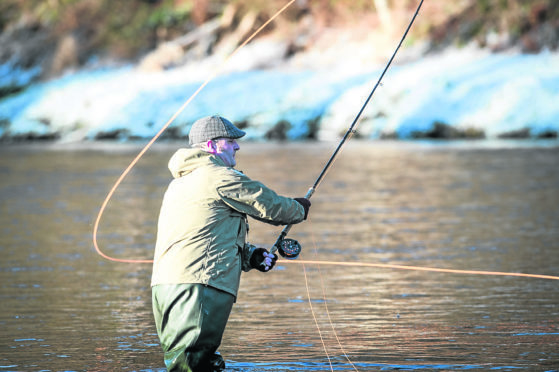 Pictures show the official opening of the River Spey for fishing.