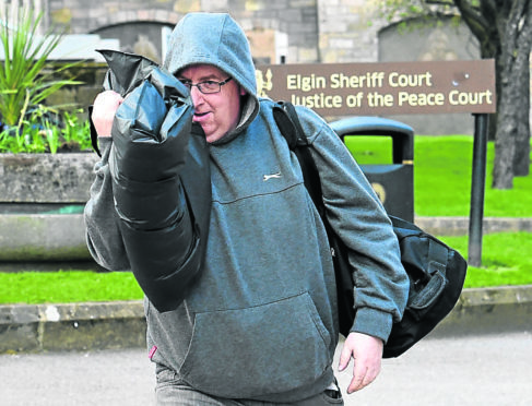 Bryan Reid leaving Elgin Sheriff Court, Moray.