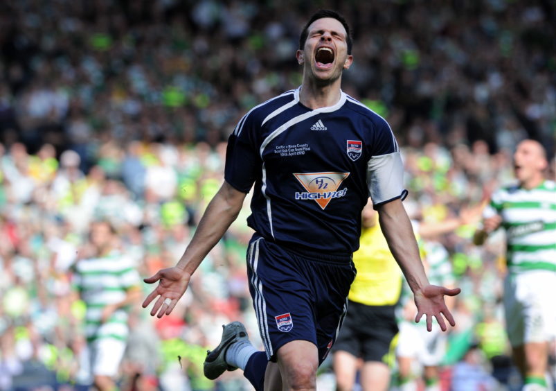 Ross County striker Steven Craig celebrates after opening the scoring against Celtic in their Scottish Cup semi-final match at Hampden.