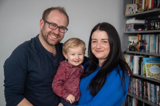 Andy Irvine and Cheryl Mainland with their son, Miller