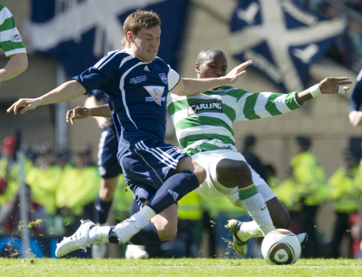 Andrew Barrowman (left) and Celtic's Landry N'Guemo