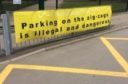 Banners have been put up outside Cults Primary highlighting how “dangerous” it is for motorists to stop on zig-zag lines.