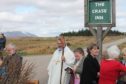 The Crask Inn, near Lairg in Sutherland. In white robes is the Most Rev Mark Strange, the Episcopalian Bishop of the United Diocese of Moray, Ross and Caithness.