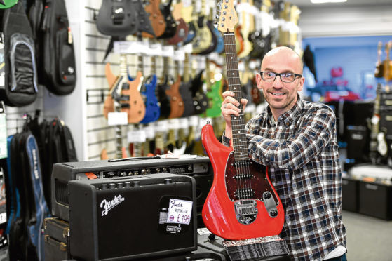 Roger Catherwood, owner of The Music Shop in Church Street, Inverness.