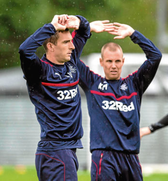 08/09/16 
 RANGERS TRAINING 
 THE RANGERS FOOTBALL CENTRE - GLASGOW 
 Rangers' Lee Wallace (left) with Kenny Miller