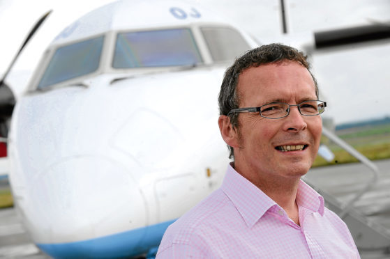 Photograph by Sandy McCook, Inverness 5th Sept '11

Flybe and Inverness Airport launch a new flight to Amsterdam. Managing Director of Highlands and Islands Airports Inglis Lyon at Inverness Airport.