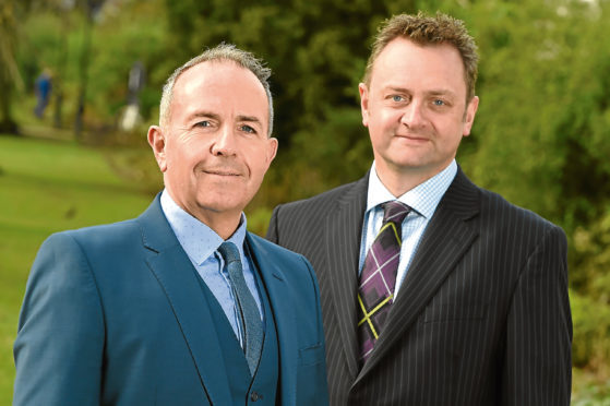 Elevator chief executive Gary McEwan and Malcolm Buchanan, managing director of Corporate and Commercial Banking in Scotland for RBS.